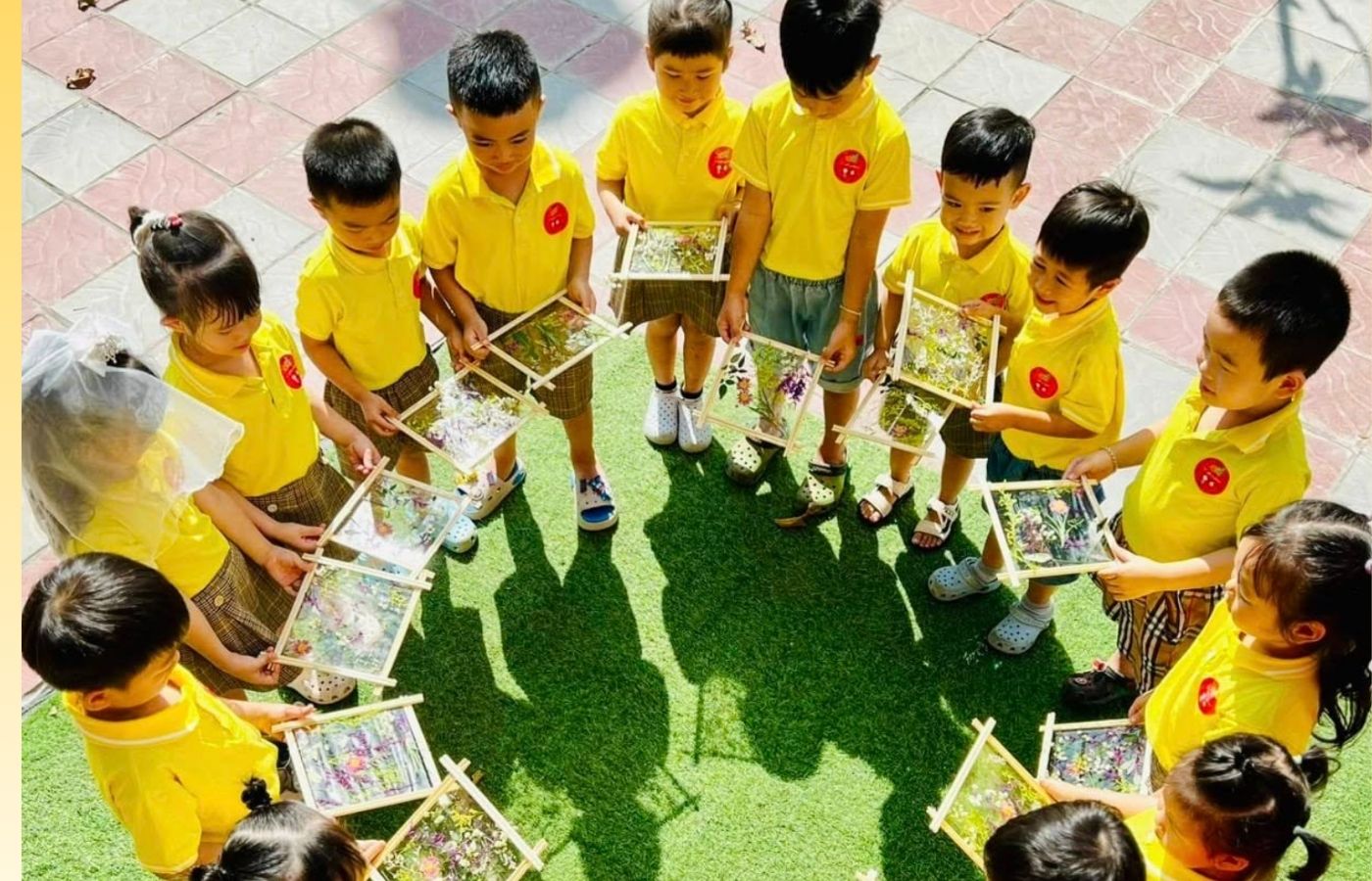 Parents, teachers and young children participating in a small community early learning activity