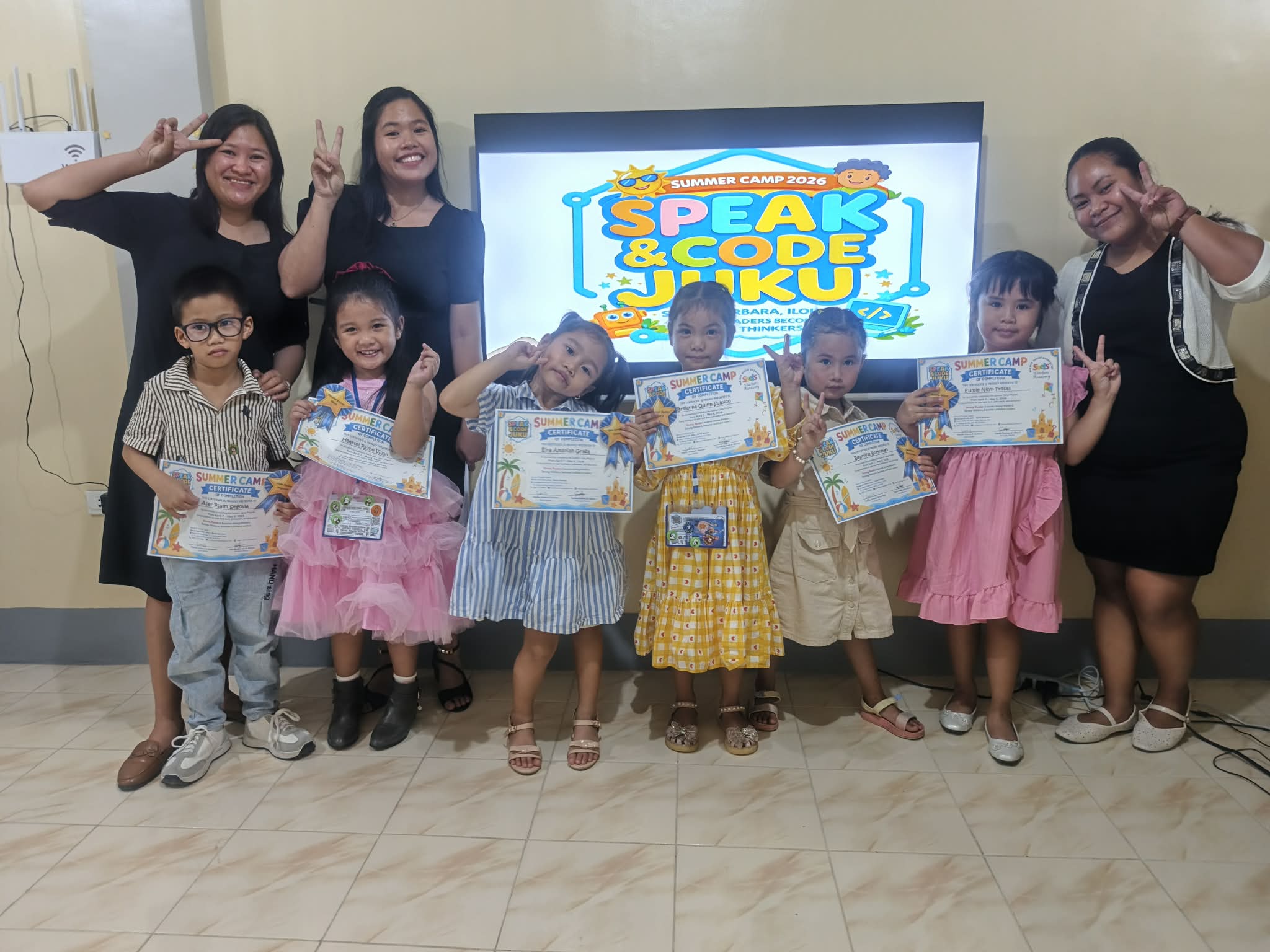 Children and teachers representing a shared Montessori-informed foundation leading to Filipino and English reading and writing