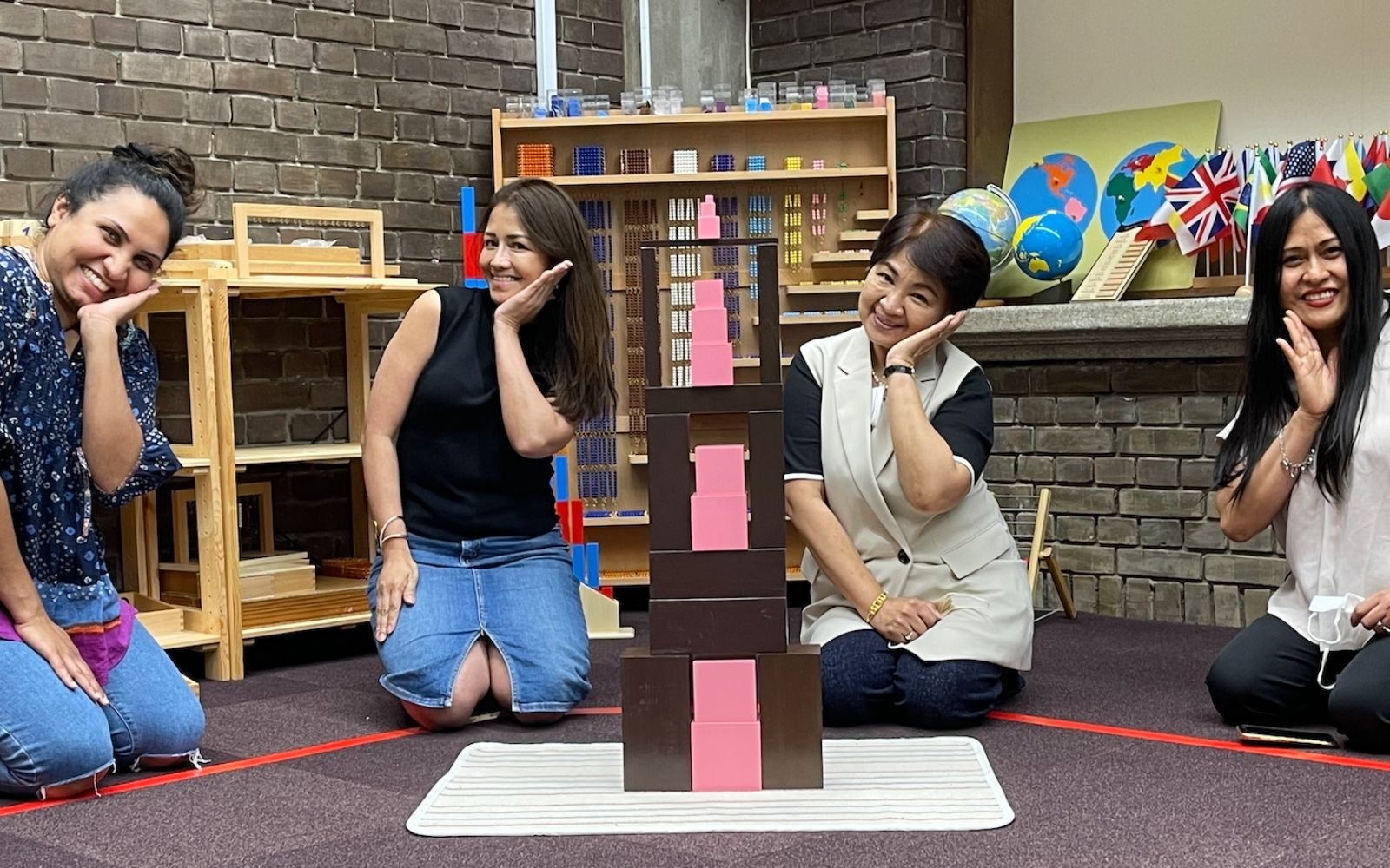 Educator supporting a diverse learner through individualized Montessori-inspired learning